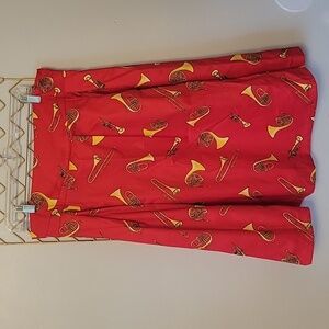 Lindy Bop red skirt with brass instruments